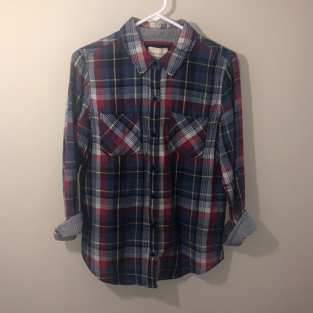 Multi colored button up flannel shirt